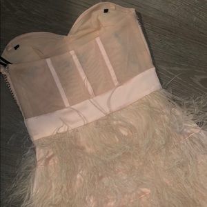 bebe Dresses - Pink nude mini dress with studs and feathers bebe Dresses - Pink nude mini dress with studs and feathers